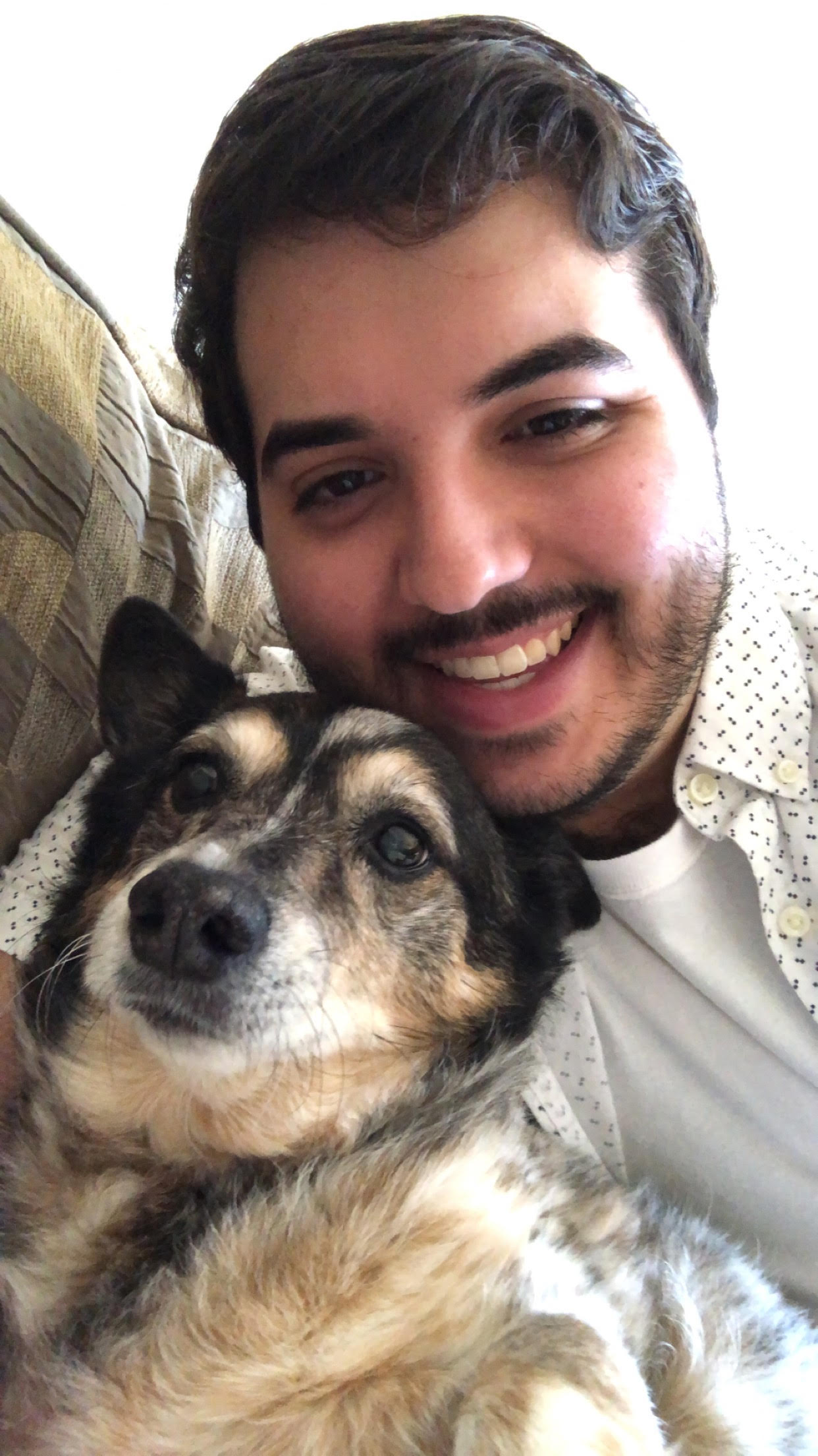 A image of Christian and his dog.